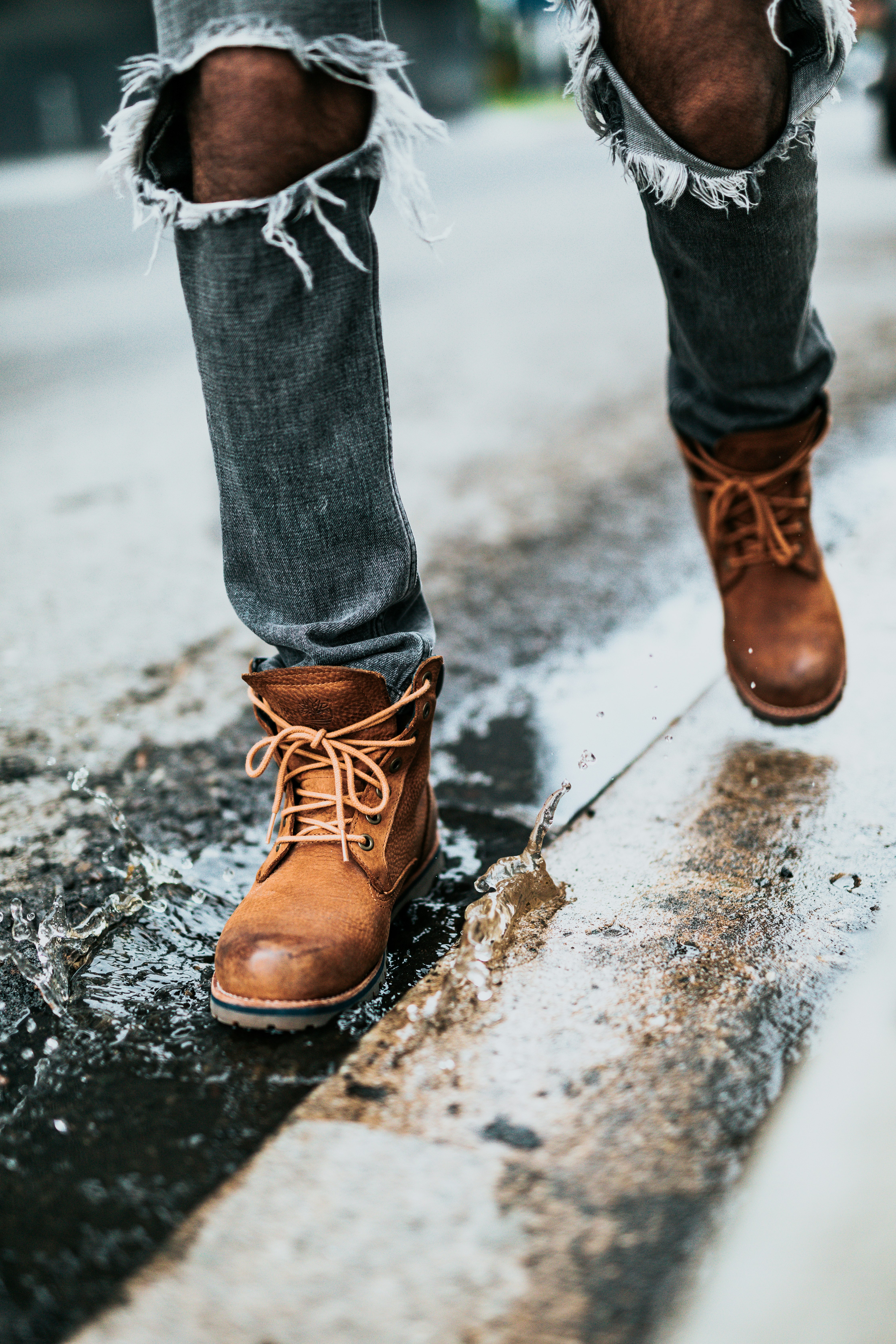 person walking on wet street